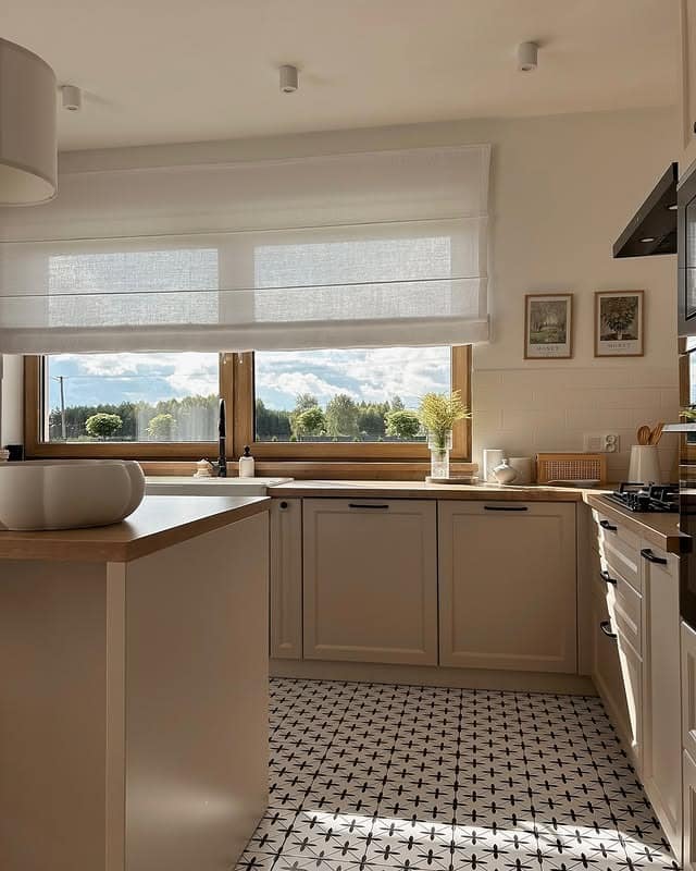 14. Cottage-Inspired Beige Kitchen with Patterned Tile Floor - beige kitchen ideas