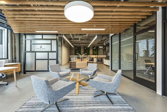 4. Industrial Greige Collaborative Studio - earth tones office ideas