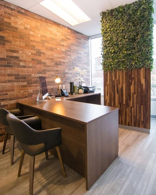 7. Brick & Walnut Biophilic Office Design - earth tones office ideas