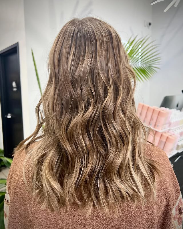 10. Caramel Beige Blonde with Soft Waves - Fall Blonde Hair Color