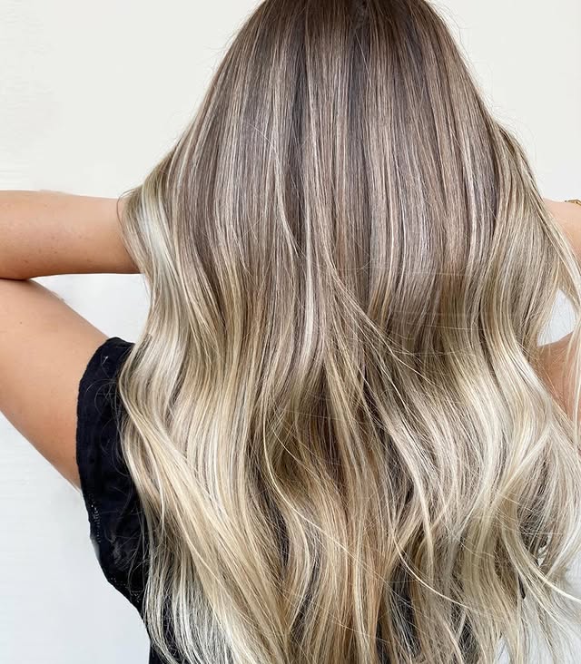 22. Cool Pearl Blonde Balayage with Long Layers - Fall Blonde Hair Color