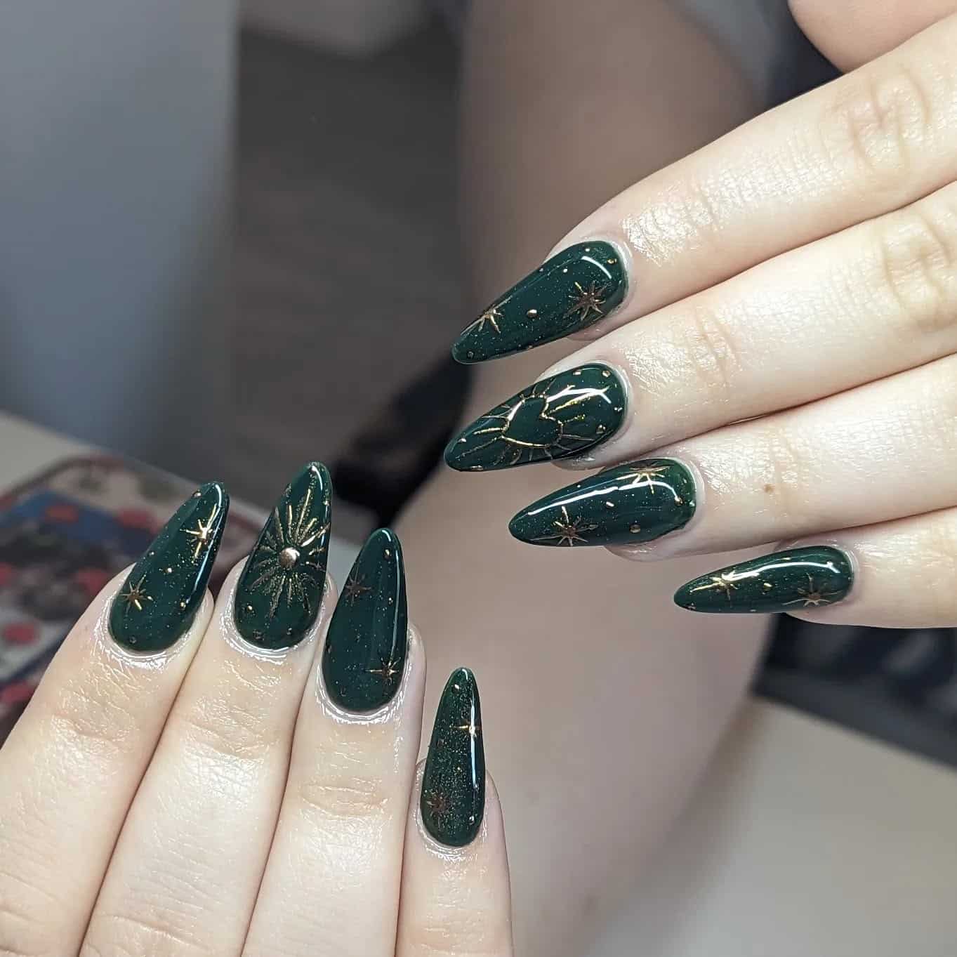 4. Celestial Hunter Green Almond Nails with Gold Detailing - hunter green nail ideas