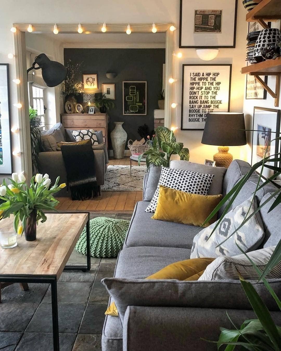 2. Moody Boho Living Room with Charcoal and Mustard Accents - boho living room ideas