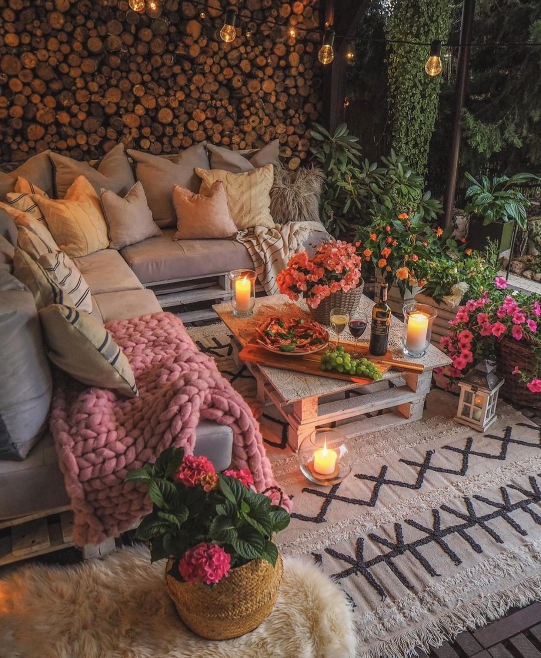 3. Rustic Outdoor Boho Lounge in Earthy Tones and Blush - boho living room ideas