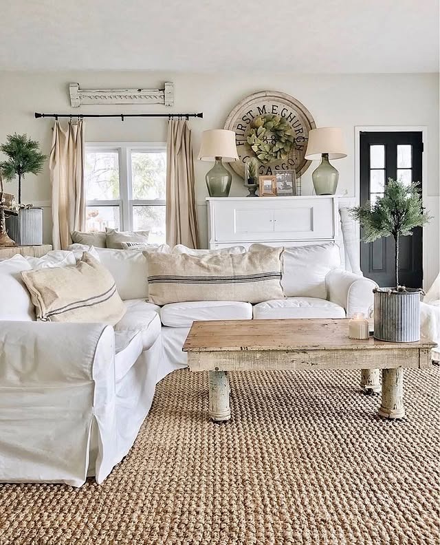 4. Modern Farmhouse Boho Living Room in Cream and Natural Jute - boho living room ideas