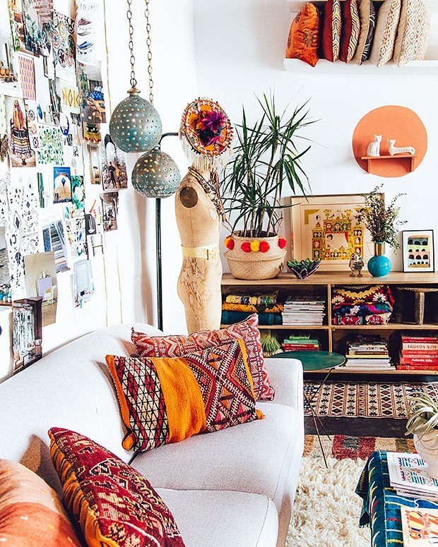 19. Eclectic Boho Living Room in Coral and Indigo - boho living room ideas