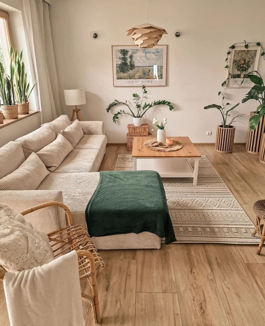 22. Minimalist Boho Living Room in Beige and Forest Green - boho living room ideas