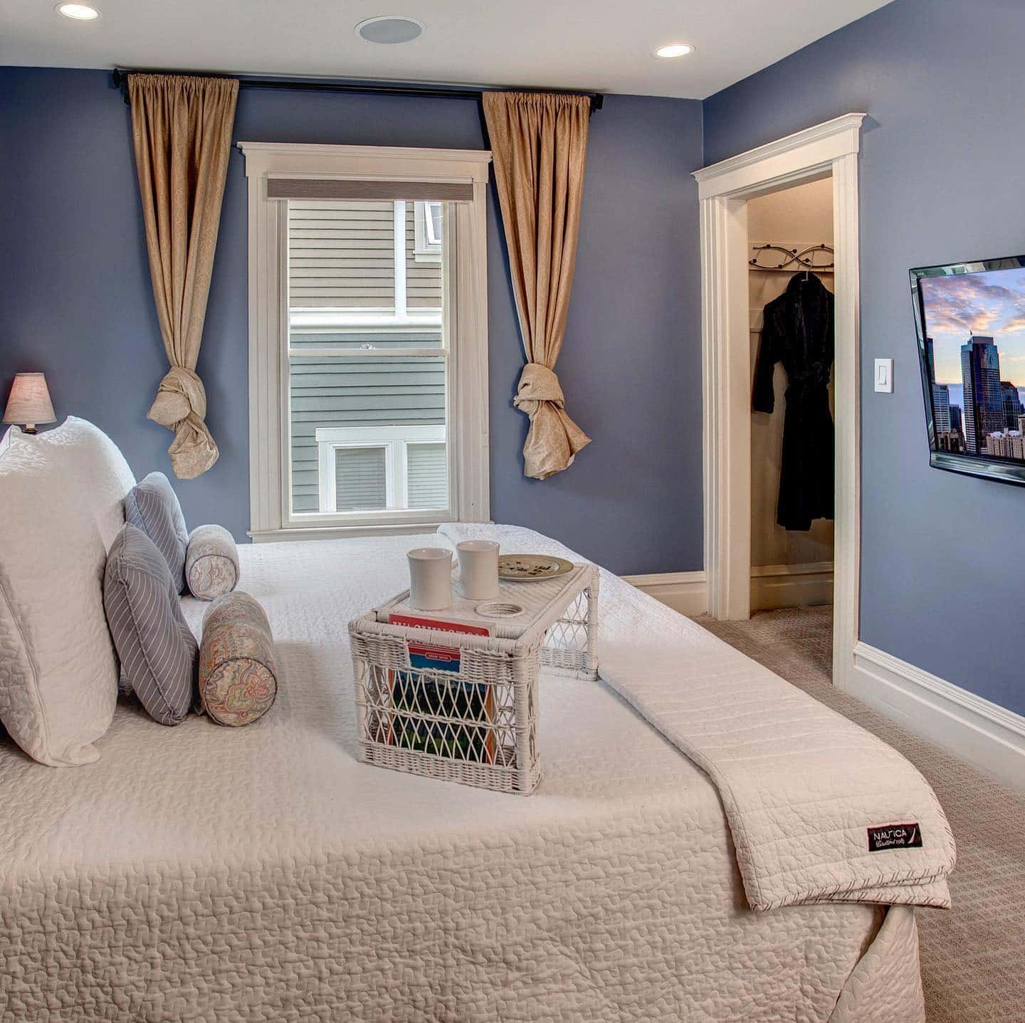 1. Classic Blue & Linen Sunroom Bedroom - sunroom bedroom ideas