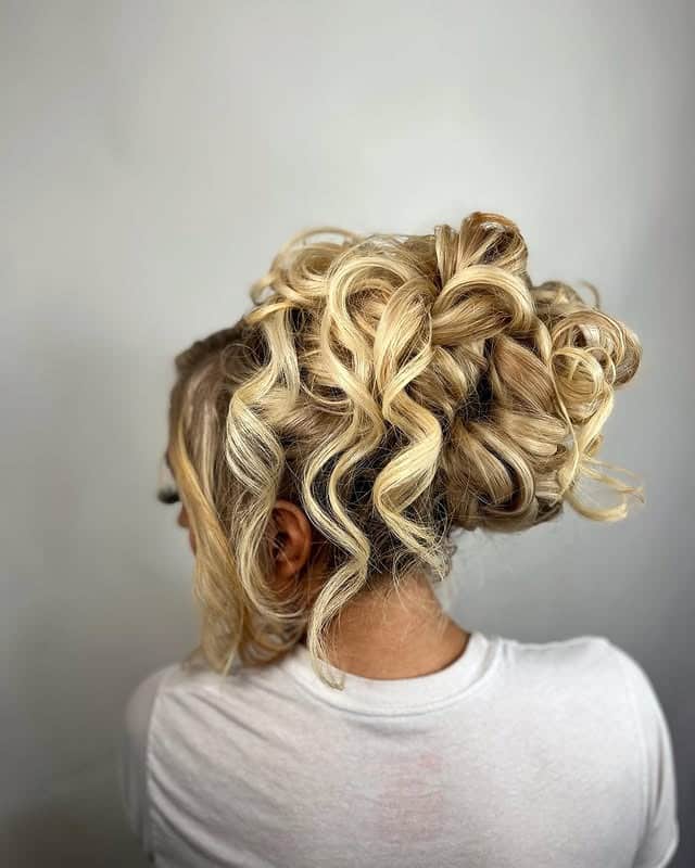 5. Golden Blonde Curly Statement Bun - Birthday Hairstyles