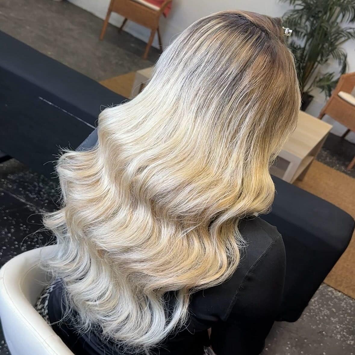 12. Icy Blonde Glamorous Layered Waves - Birthday Hairstyles