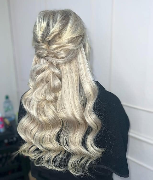 18. Platinum Blonde Twisted Half-Up Curls - Birthday Hairstyles