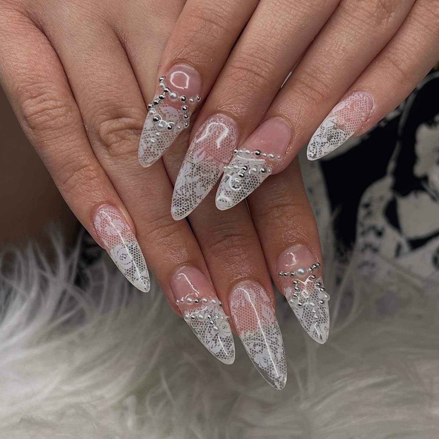 2. White Lace French Stiletto Nails with Crystal Accents - lace nail ideas