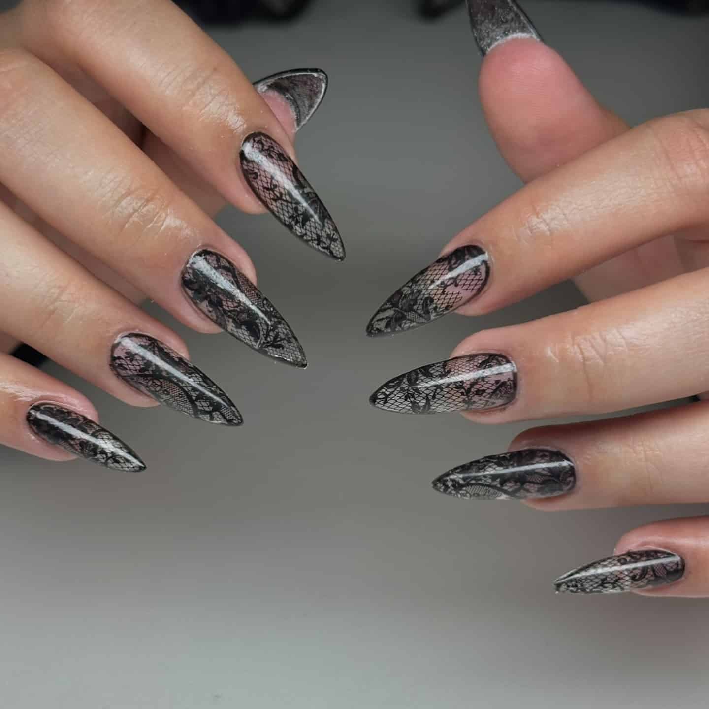 9. Smoky Black Lace Almond Nails - lace nail ideas