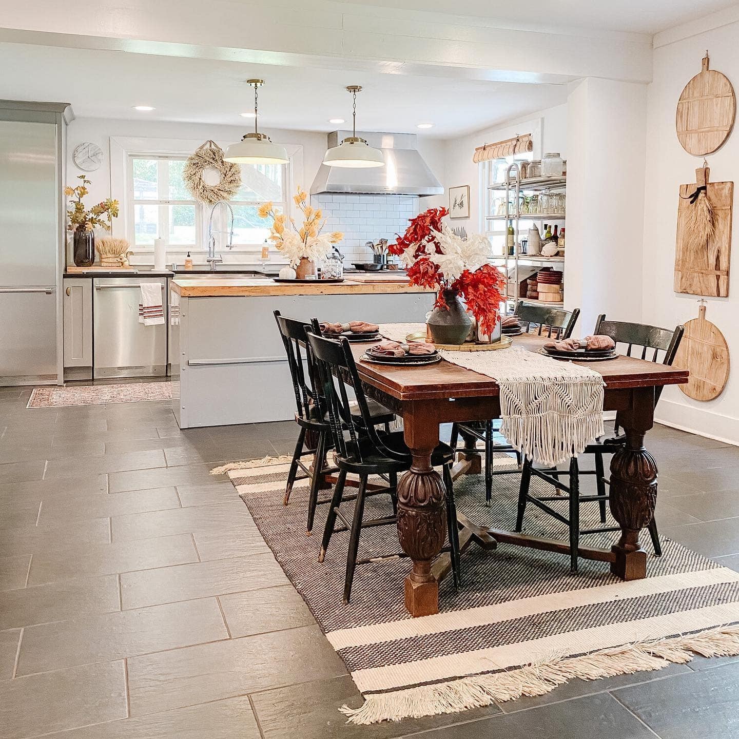 3. Modern Farmhouse Kitchen with Rustic Wood and Harvest Tones - fall kitchen decor ideas