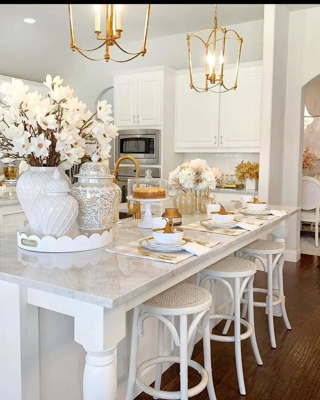 5. Elegant White and Gold Kitchen with Sophisticated Autumn Touches - fall kitchen decor ideas
