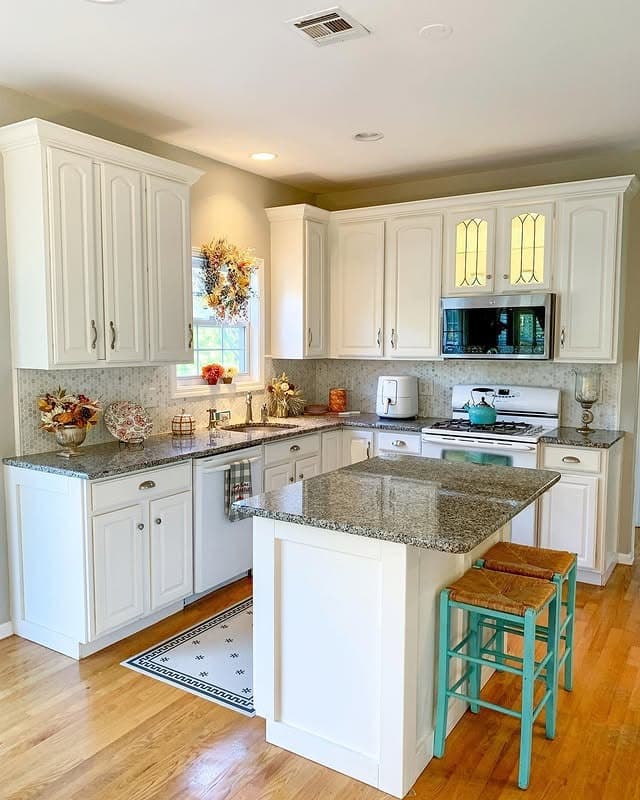 10. Cozy Traditional Kitchen with Granite and Rustic Accents - fall kitchen decor ideas