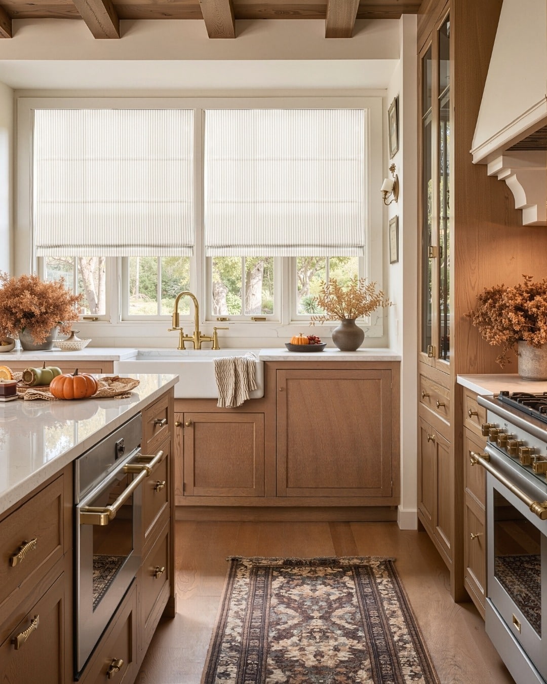 20. Natural Wood Kitchen with Brass Fixtures and Soft Autumn Accents - fall kitchen decor ideas