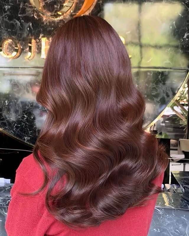 5. Warm Cinnamon Cherry Brown with Soft Body Waves - Cherry Brown Hair Color