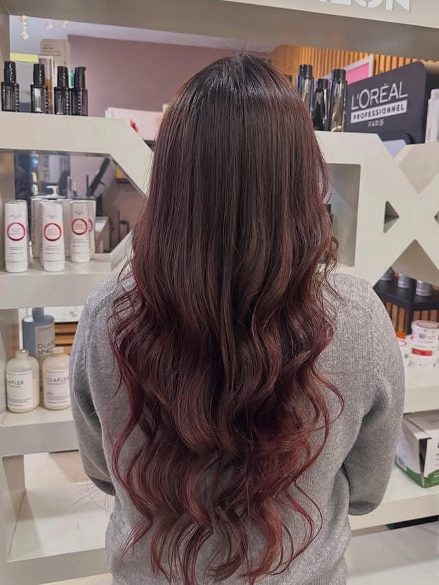 7. Dimensional Cherry Brown Balayage Waves - Cherry Brown Hair Color