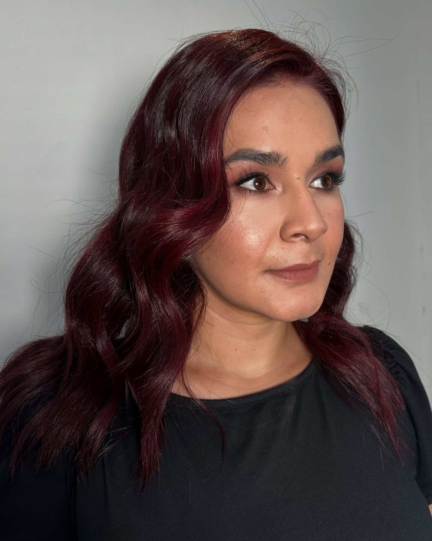 9. Ruby Cherry Brown with Soft Vintage Waves - Cherry Brown Hair Color