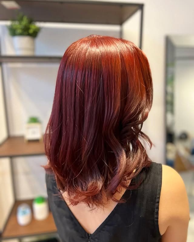 10. Copper-Infused Cherry Brown with Layered Volume - Cherry Brown Hair Color
