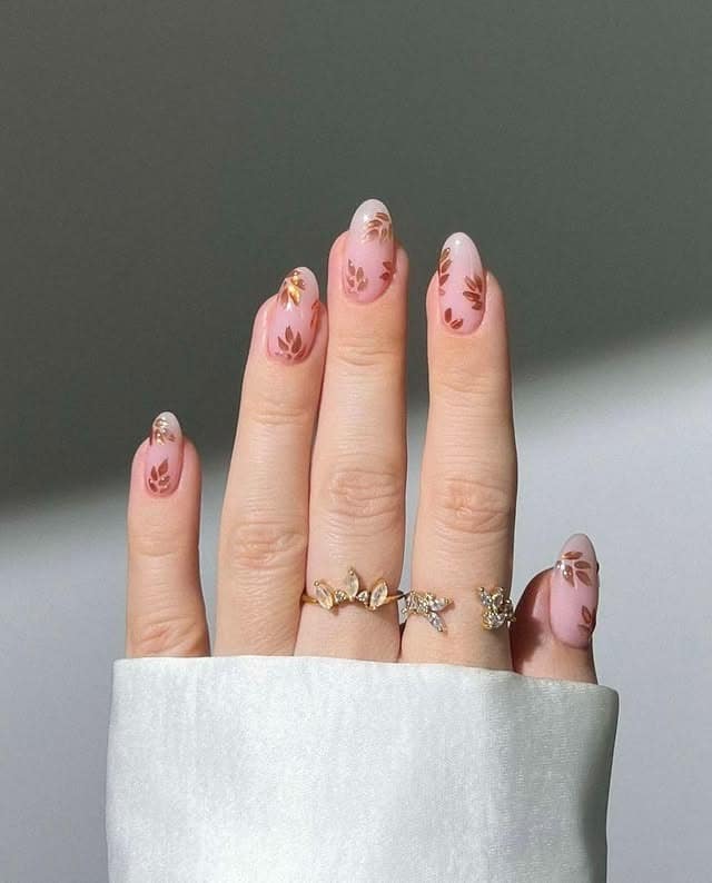 17. Soft Pink Almond Nails with Bronze Leaf Pattern - leaves nail ideas