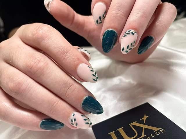 21. Deep Teal Almond Nails with Minimal Leaf Branch Art - leaves nail ideas