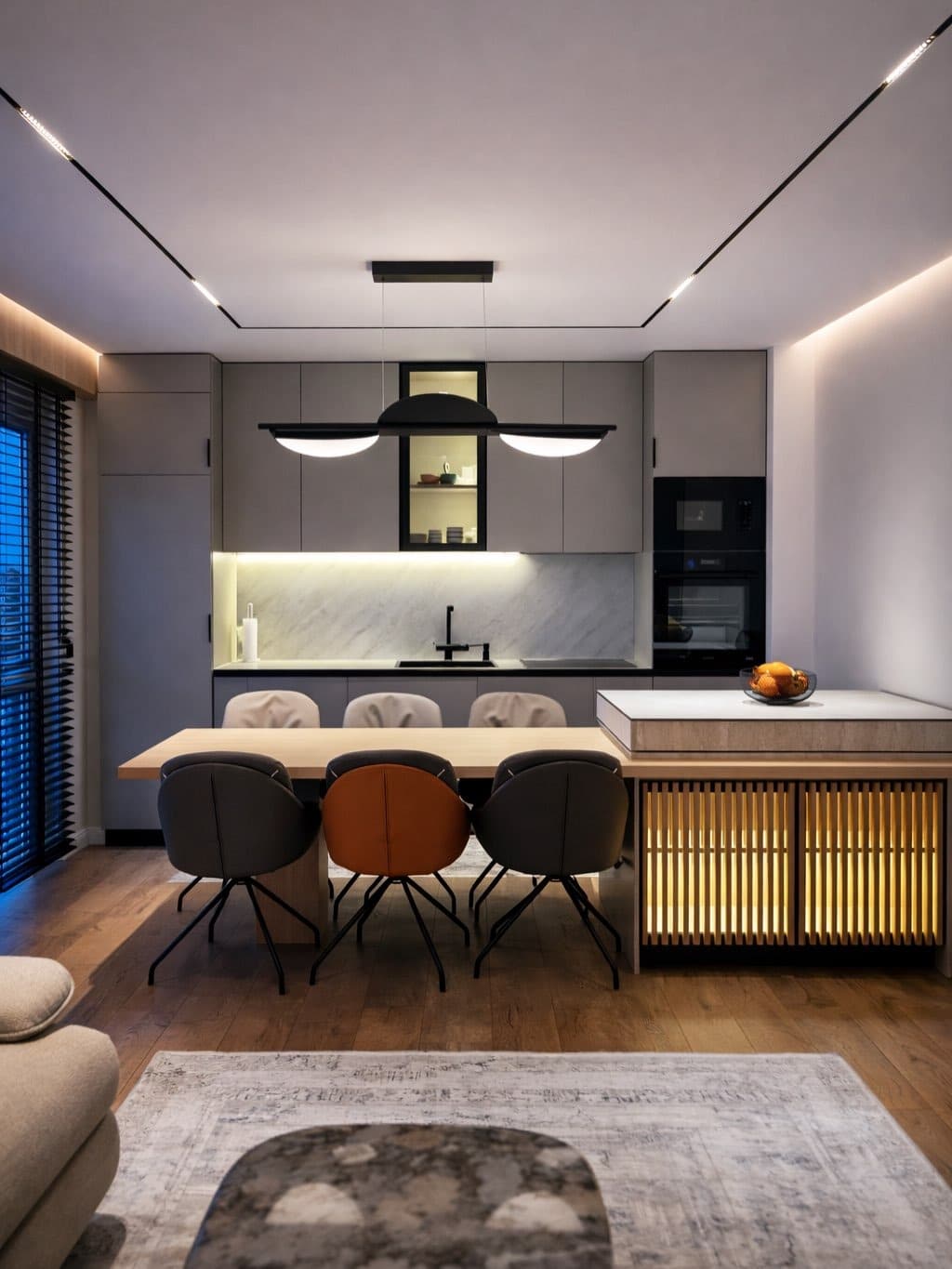 3. Moody Modern Kitchen with Integrated Dining Area - modern kitchen ideas