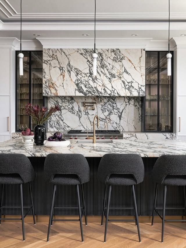 8. Marble Statement Kitchen with Dramatic Veining - modern kitchen ideas