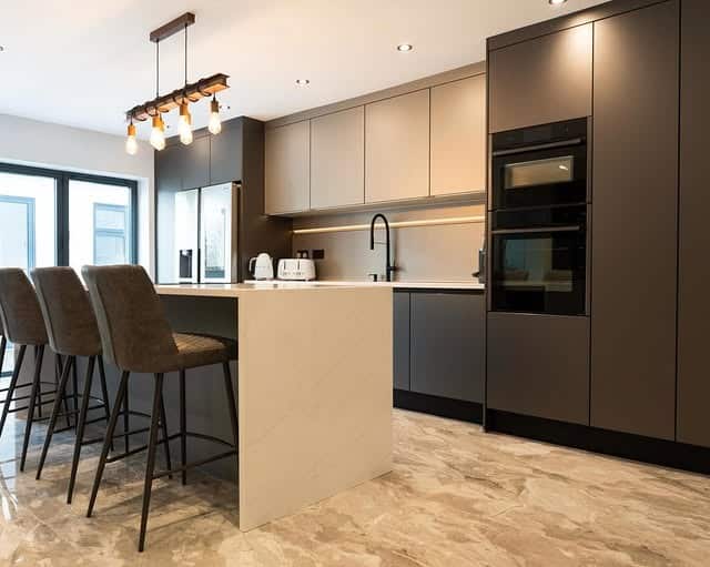 14. Contemporary Two-Tone Kitchen with Marble Island - modern kitchen ideas