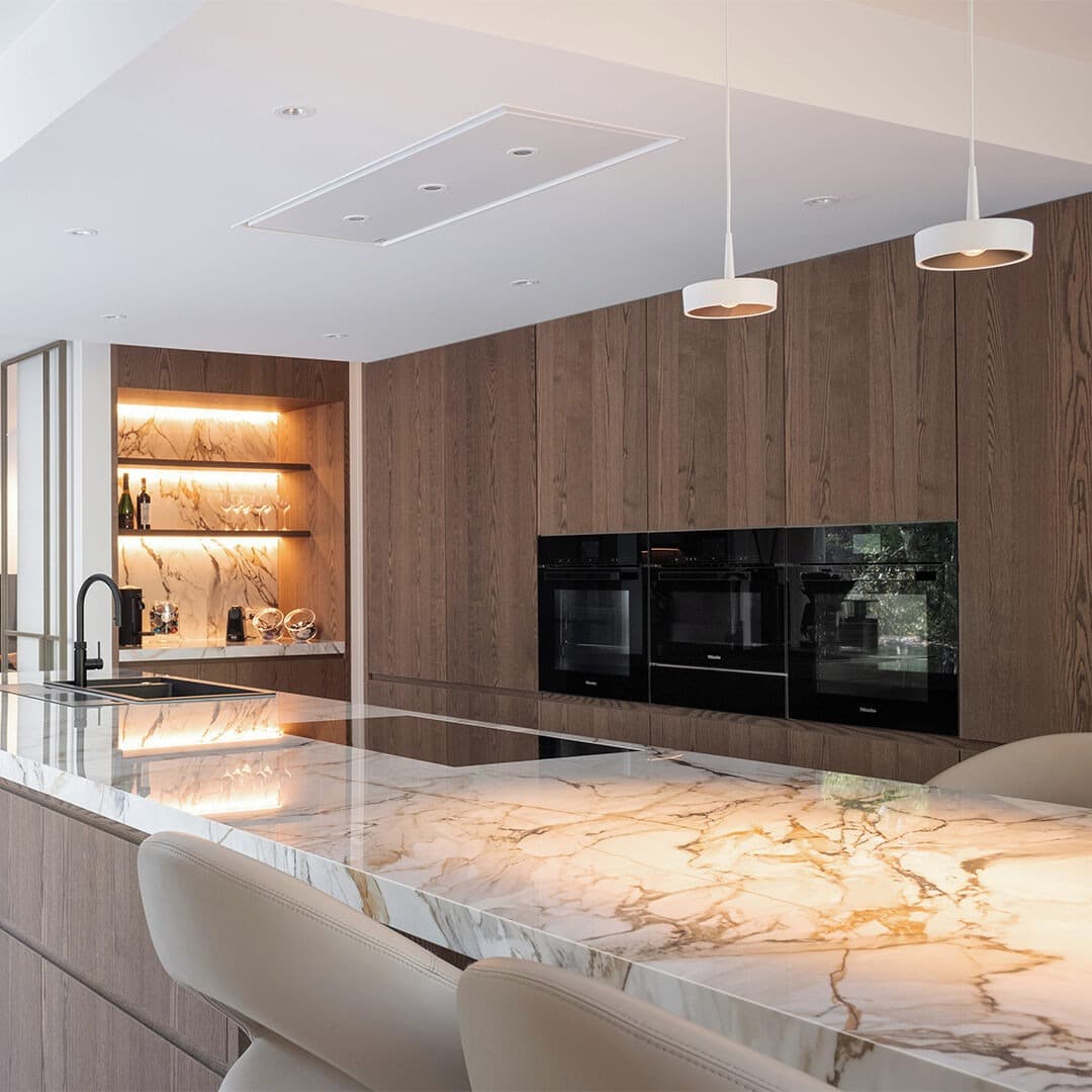 21. Walnut Contemporary Kitchen with Dramatic Marble Island - modern kitchen ideas