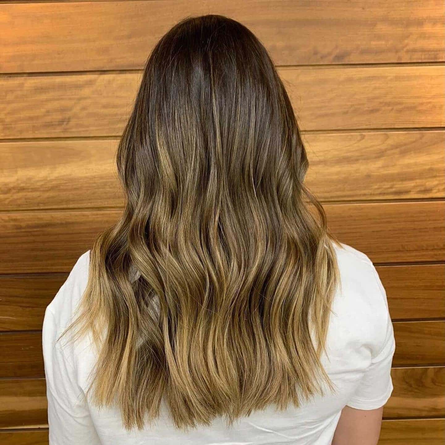 15. Soft Brunette to Beige Blonde Balayage Waves - Blonde Brown Hair Color