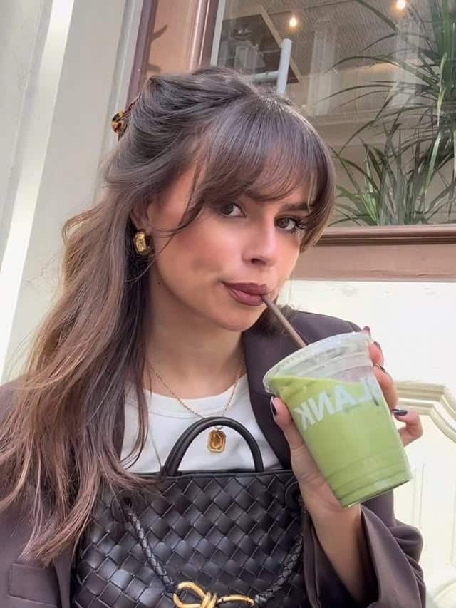 3. Soft Layered Medium Cut with Ash Brown Wispy Bangs - Medium Haircuts With Bangs