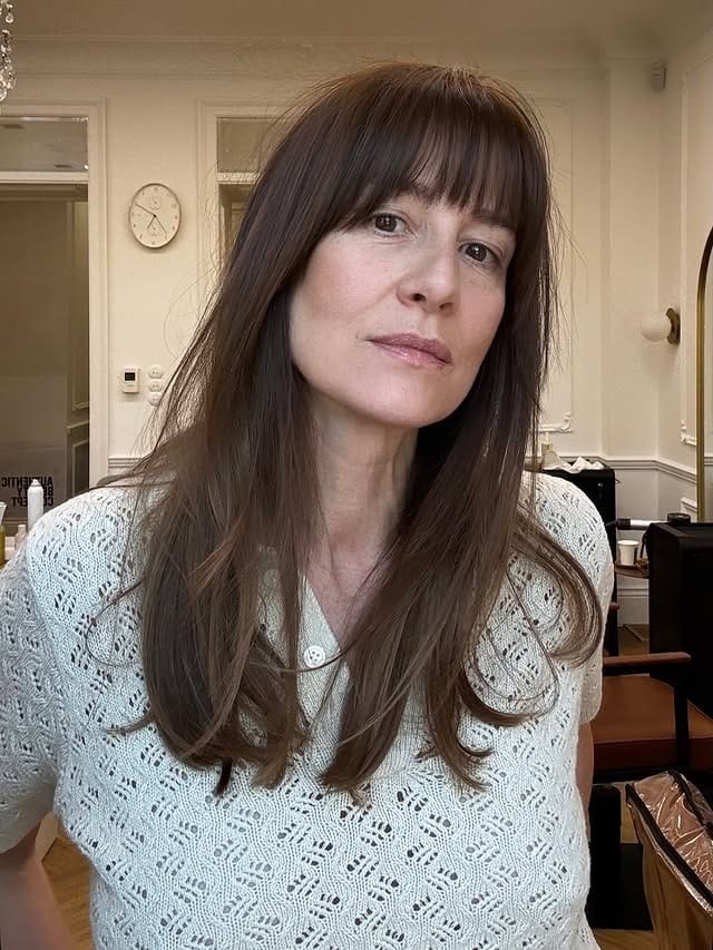 11. Soft Layered Medium Cut with Cocoa Brown Full Bangs - Medium Haircuts With Bangs