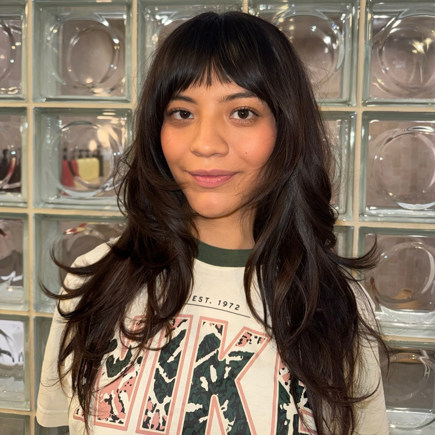 16. Airy Medium Shag Layers with Dark Chocolate Feathered Bangs - Medium Haircuts With Bangs