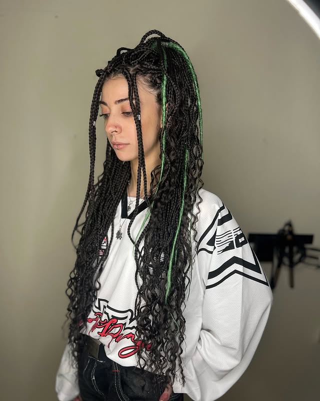 5. Curly Cornrow Braids with Green Highlights - Cornrow Hairstyles