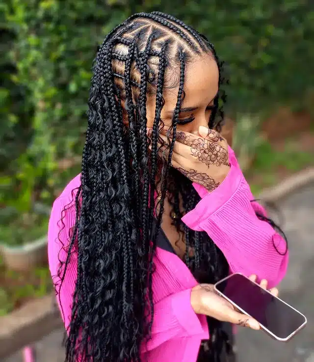 14. Patterned Cornrow Braids with Curly Extensions in Black - Cornrow Hairstyles