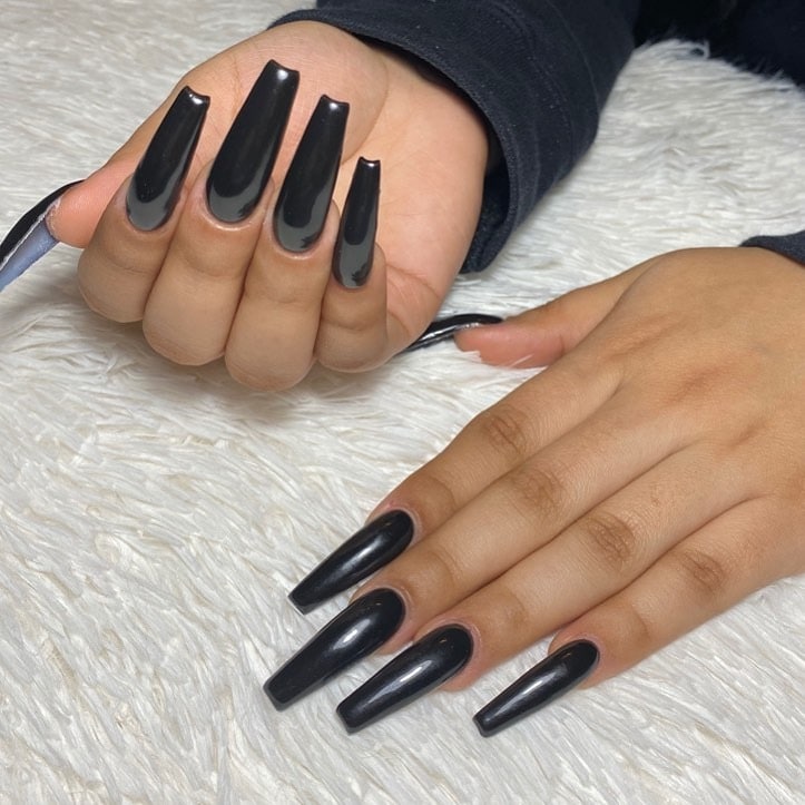 12. Long Black Coffin Nails with High-Gloss Finish - long black nail ideas