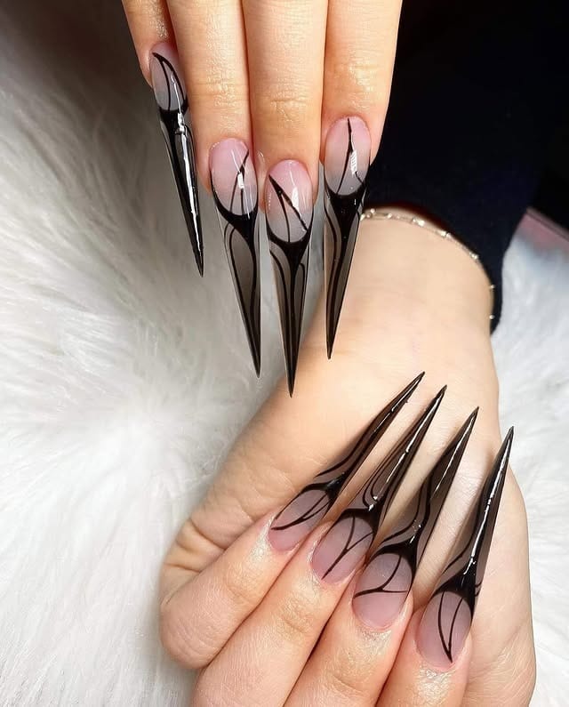 20. Abstract Black Line Art Stiletto Nails - long black nail ideas