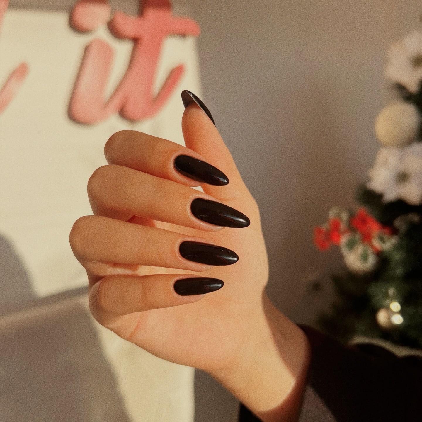22. Classic Black Medium Almond Nails - long black nail ideas