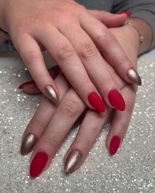 10. Matte Red Almond Nails with Metallic Gold Accent - matte red nail ideas