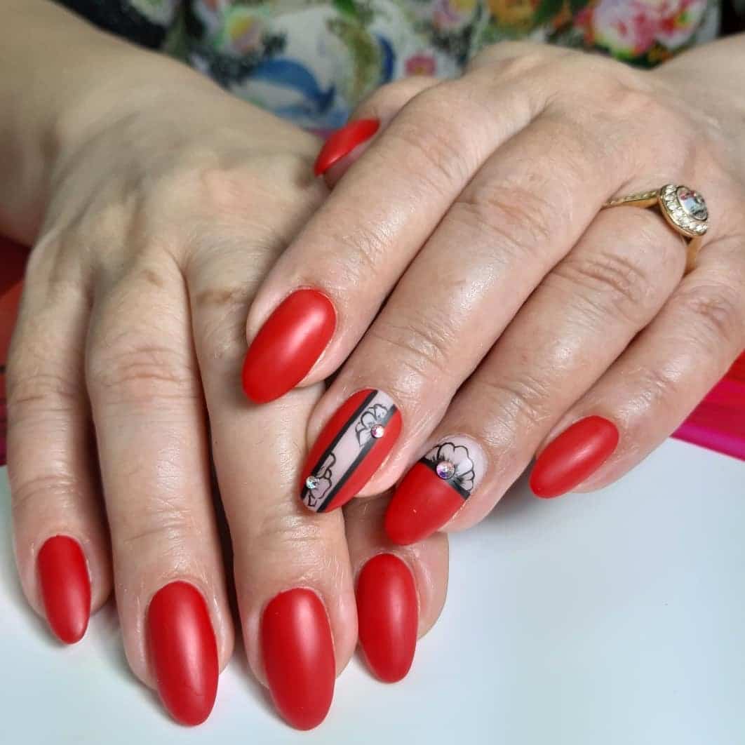 18. Matte Red Almond Nails with Floral Line Art - matte red nail ideas