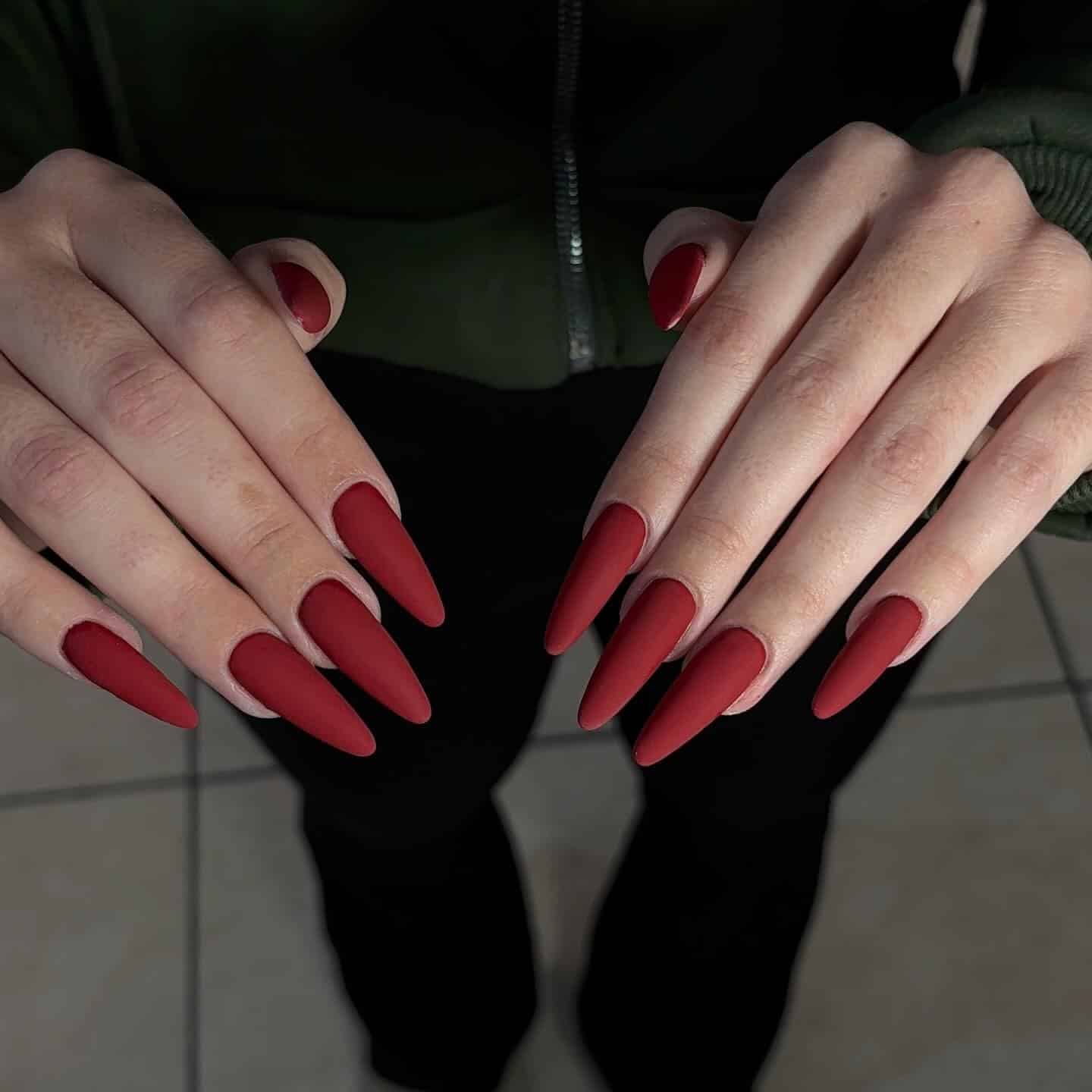 21. Matte Brick Red Stiletto Nails - matte red nail ideas