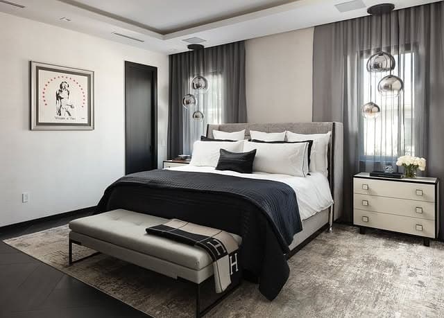 6. Modern Gray Bedroom with Sculptural Glass Lighting - moody bedroom ideas