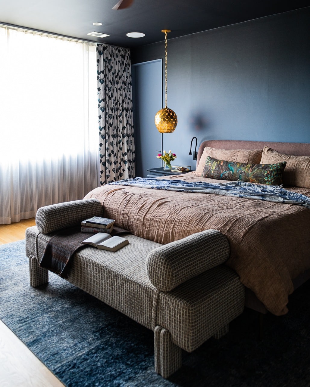 10. Contemporary Moody Bedroom with Sculptural Pendant Light - moody bedroom ideas