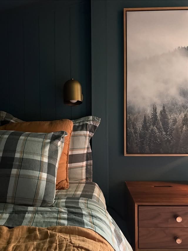 14. Deep Teal Bedroom with Plaid Bedding and Warm Wood Accents - moody bedroom ideas