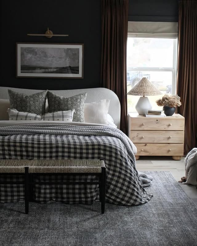15. Black Accent Wall Bedroom with Checkered Textiles and Natural Wood - moody bedroom ideas