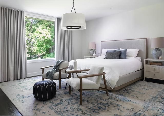 1. Soft Neutral Bedroom with Relaxed Seating and Layered Textures - serene bedroom ideas