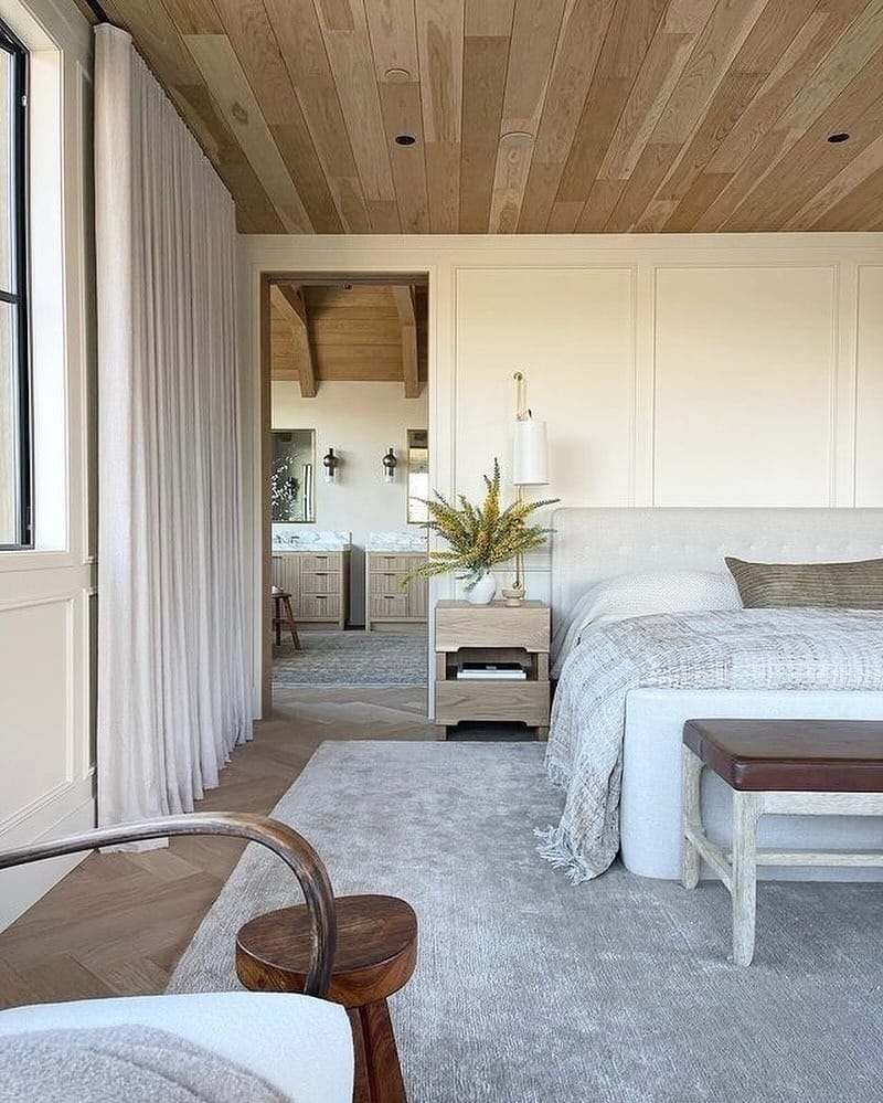 4. Warm Wood Ceiling Bedroom with Light Neutral Palette - serene bedroom ideas