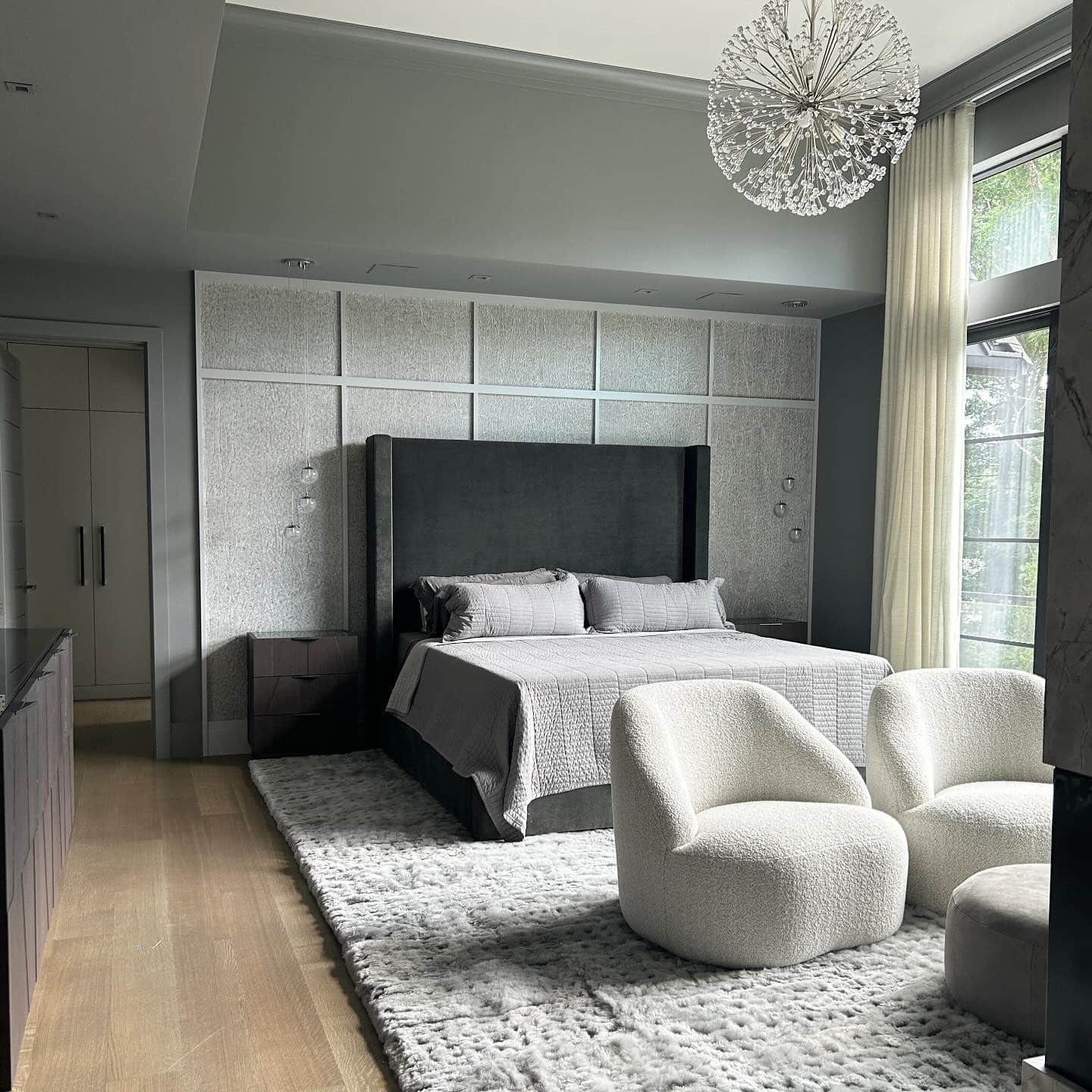 7. Contemporary Gray Bedroom with Sculptural Lighting - serene bedroom ideas